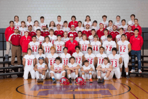 IHSAA Falcons football team posing for a photograph