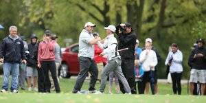 Shaking hands in celebration during a golf meet