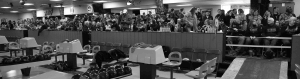 Black and white image of people watching an IHSAA bowling match