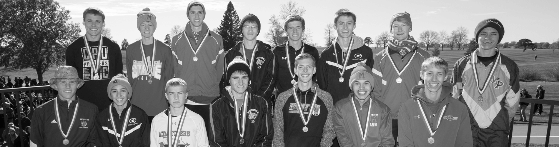 Students posing for a photo with their medals