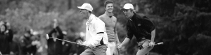 Image of two young men celebrating during a game of golf