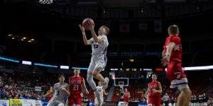 Norwalk basketball player mid-air