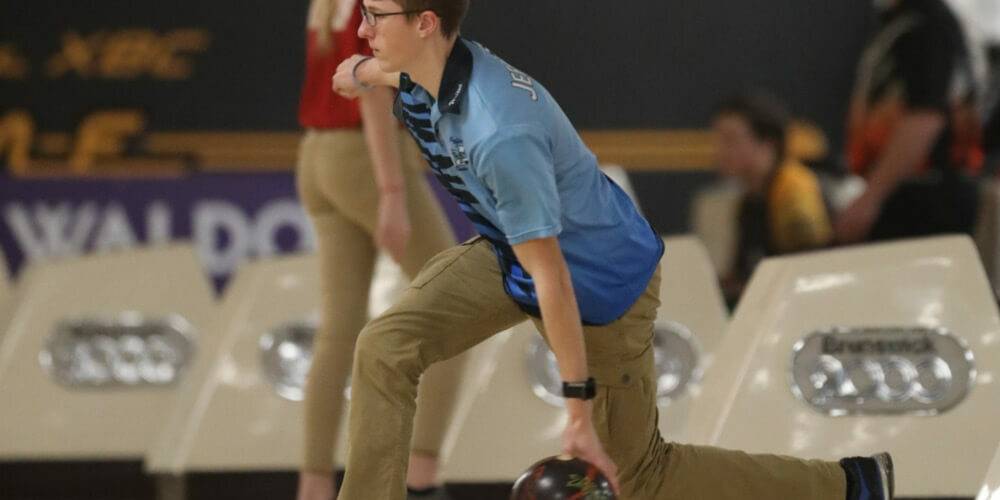 Mid-throw during a bowling game