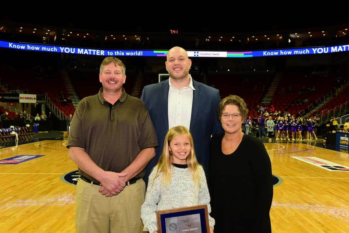 a family accepting an award